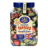 A large clear plastic jar filled with assorted wrapped toffees and chocolate éclairs, sealed with a dark blue lid. The front label reads Walker's Assorted Toffees and Chocolate Éclairs, with colorful foil wrappers visible throughout.